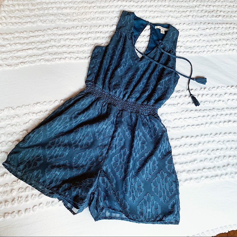 Francesca’s Romper Lace & Tassel Tie